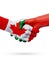 Flags Canada, Portugal countries, partnership friendship handshake concept.