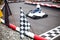 Flags and cars on carting track