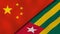 The flags of China and Togo. News, reportage, business background. 3d illustration
