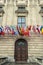 Flags of the countries of the European community on the facade of the building of the Organization for Security and Cooperation in