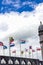 Flags of different countries against the sky. Lourdes, France, Hautes Pyrenees