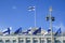 Flags of Europe and Finland waving together on the Presidential Palace in Helsinki