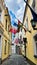 Flags of European states on the narrow streets of the old city of Riga