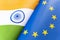 Flags European Union and india. concept of international relations between countries. The state of governments