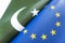 Flags European Union and pakistan. concept of international relations between countries. The state of governments