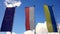 Flags of the European Union, Poland and Ukraine waving in the wind with the sky in the background