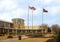 Flags flying in Allen Civic Plaza behind the Allen City Hall in Texas.