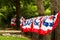 Flags flying on the fence to celebrate US freedoms and honor those who serve in the military.