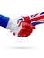 Flags France, United Kingdom countries, partnership friendship handshake concept.