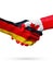 Flags Germany, Canada countries, partnership friendship handshake concept.