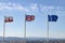 The flags of Gibraltar, UK and the EU flying in Gibraltar