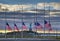 Flags at half staff in front of Statue of Liberty