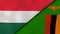 The flags of Hungary and Zambia. News, reportage, business background. 3d illustration