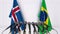 Flags of Iceland and Brazil at international meeting or conference. 3D rendering