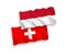 Flags of Indonesia and Switzerland on a white background