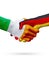 Flags Ireland, Germany countries, partnership friendship handshake concept.