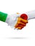 Flags Ireland, Japan countries, partnership friendship handshake concept.