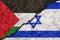 Flags of Israel and Palestine painted on cracked wall background