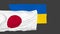 Flags of Japan and Ukraine. 3d simulation. Friendship of countries.