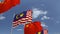 Flags of Malaysia and China against blue sky, loopable 3D animation