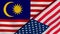 The flags of Malaysia and United States. News, reportage, business background. 3d illustration