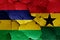 Flags of Mauritius and Ghana painted on cracked wall