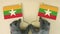 Flags of Myanmar made of recycled paper on the cardboard table