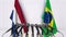 Flags of the Netherlands and Brazil at international meeting or conference. 3D rendering