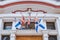 Flags of Nova Scotia and Canada in front of building