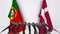 Flags of Portugal and Denmark at international meeting or negotiations press conference