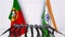 Flags of Portugal and India at international meeting or negotiations press conference