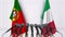 Flags of Portugal and Italy at international meeting or conference. 3D rendering