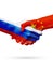 Flags Russia, China countries, partnership friendship handshake concept.