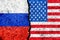 Flags of Russia and USA painted on cracked wall background/Russia versus USA conflict concept