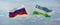 flags of Russia and Uzbekistan waving in the wind on flagpoles against sky with clouds on sunny day. Symbolizing relationship,