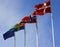 Flags from the Scandinavian countries Denmark, Norway and Sweden waving from flagpoles together with the EU, European Union, flag