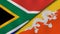 The flags of South Africa and Bhutan. News, reportage, business background. 3d illustration