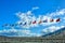 Flags of South America, Andean Community, on the background the sky.