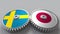 Flags of Sweden and Japan on meshing gears. International cooperation conceptual animation