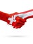Flags Switzerland, Austria countries, partnership friendship handshake concept.