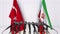 Flags of Turkey and Iran at international meeting or conference. 3D rendering