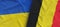 Flags of Ukraine and Belgium. Linen flags close up. Flag made of canvas. Ukrainian. Belgian, Brussels. National symbols. 3d