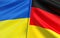 Flags of Ukraine and Germany. German flag. Blue and yellow flag. Black red yellow. Sovereign state. Independent Ukraine. 3D