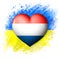 Flags of Ukraine and Netherlands. Heart color of the flag on the background of the painted flag of Ukraine. The concept of