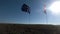 Flags of the United States of America and European Union waving together on the wind. Real shot in landscape.