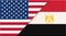 Flags of USA and Egypt. American and Egyptian national flags on fabric surface.