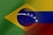 Flags of Venezuela and Brasil that come together showing a concept that means trade, political or other relationships between the