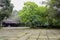 Flagstone paved courtyard before ancient Chinese building