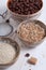 Flakes, sugar, seeds semi-cook for porridge close up in white key