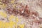 Flaking Yellow Paint on Faded Wood Background